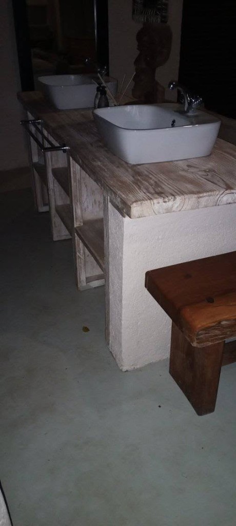 Rustic double bathroom vanity with vessel sinks