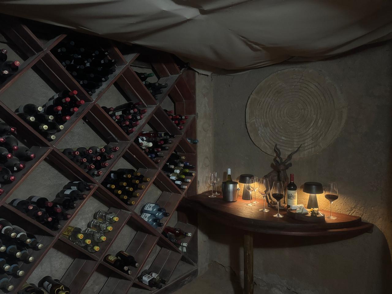 Custom diamond wine rack and live-edge tasting table
